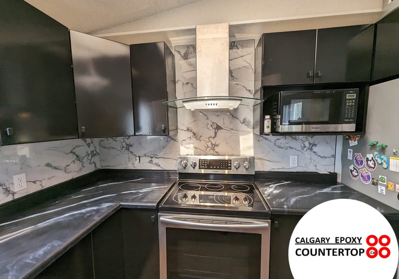 Modern seamless grout-free backsplash after refacing in Calgary kitchen